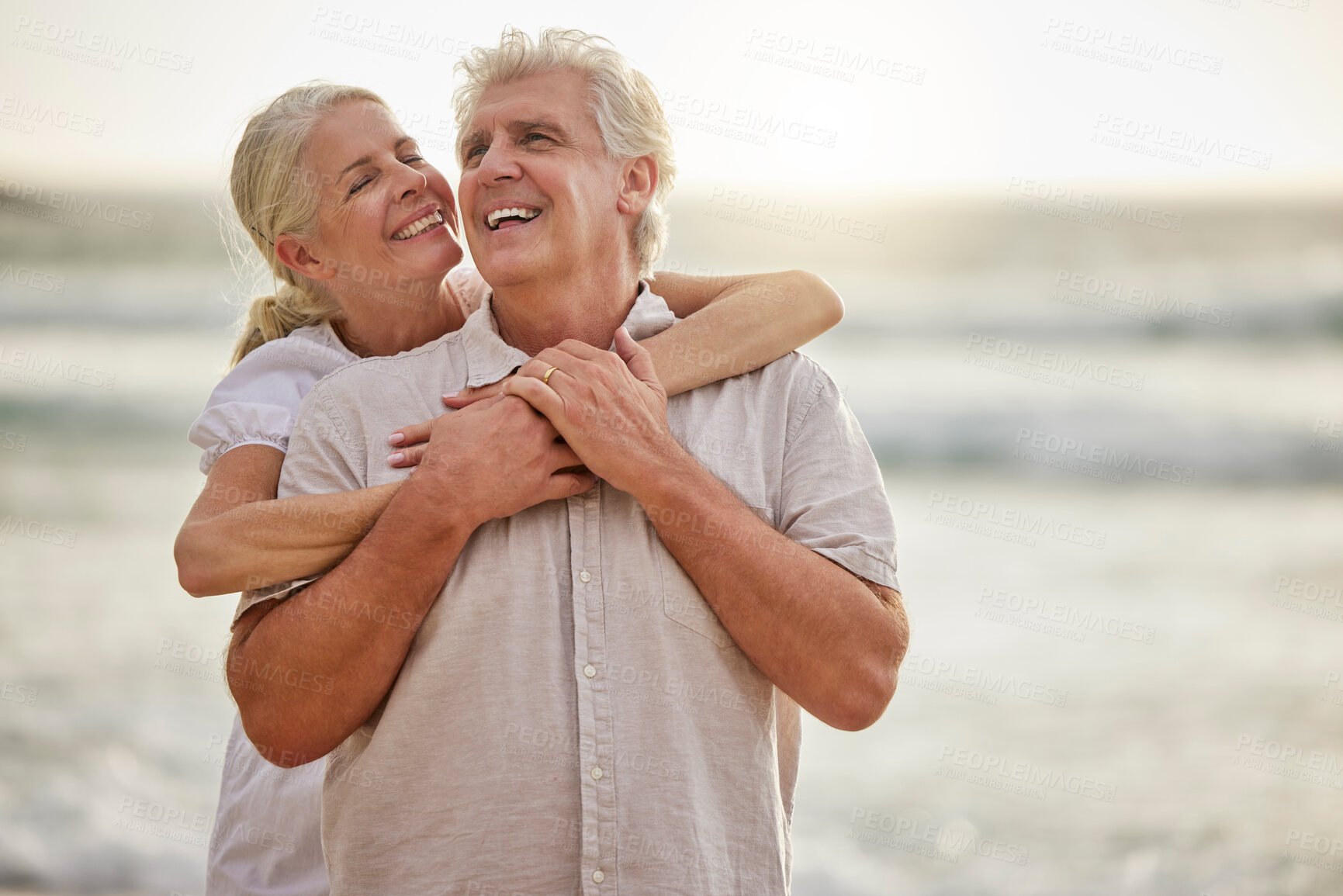 Buy stock photo Love, beach and senior couple embrace at water for bonding holiday, relax and island travel. Nature, man and woman on romantic ocean date together with hug, fun and tropical happy retirement vacation