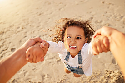 Buy stock photo Girl, kid and swing on portrait at beach for fun on break, holding and happy for playing in Spain. Female person, laugh and smile with spin on pov for child development, care and growth on holiday