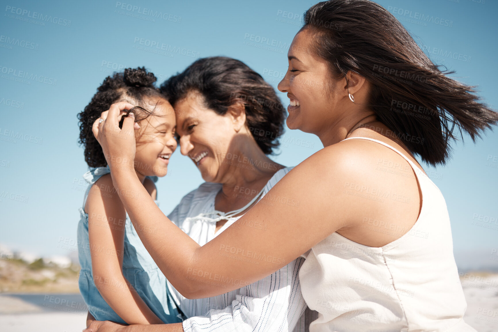 Buy stock photo Outdoor, grandma and mom with child, beach and old woman with granddaughter, bonding and break. Happy, girl and generations on vacation, sea and relax in holiday, travel or love of family in Portugal