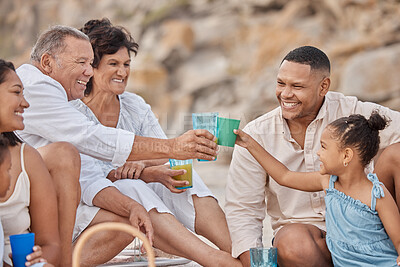 Buy stock photo Happy family, beach and cheers with drink at picnic for holiday, vacation and summer travel. Juice, toast and people by coast together with generations, parents and child at Onam celebration to relax