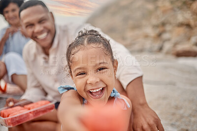 Buy stock photo Picnic, child and portrait on beach with snack, happiness and excited with family. Kid, smile and watermelon in nature for sharing, offer and refreshment on outing for travel and fun in Brazil