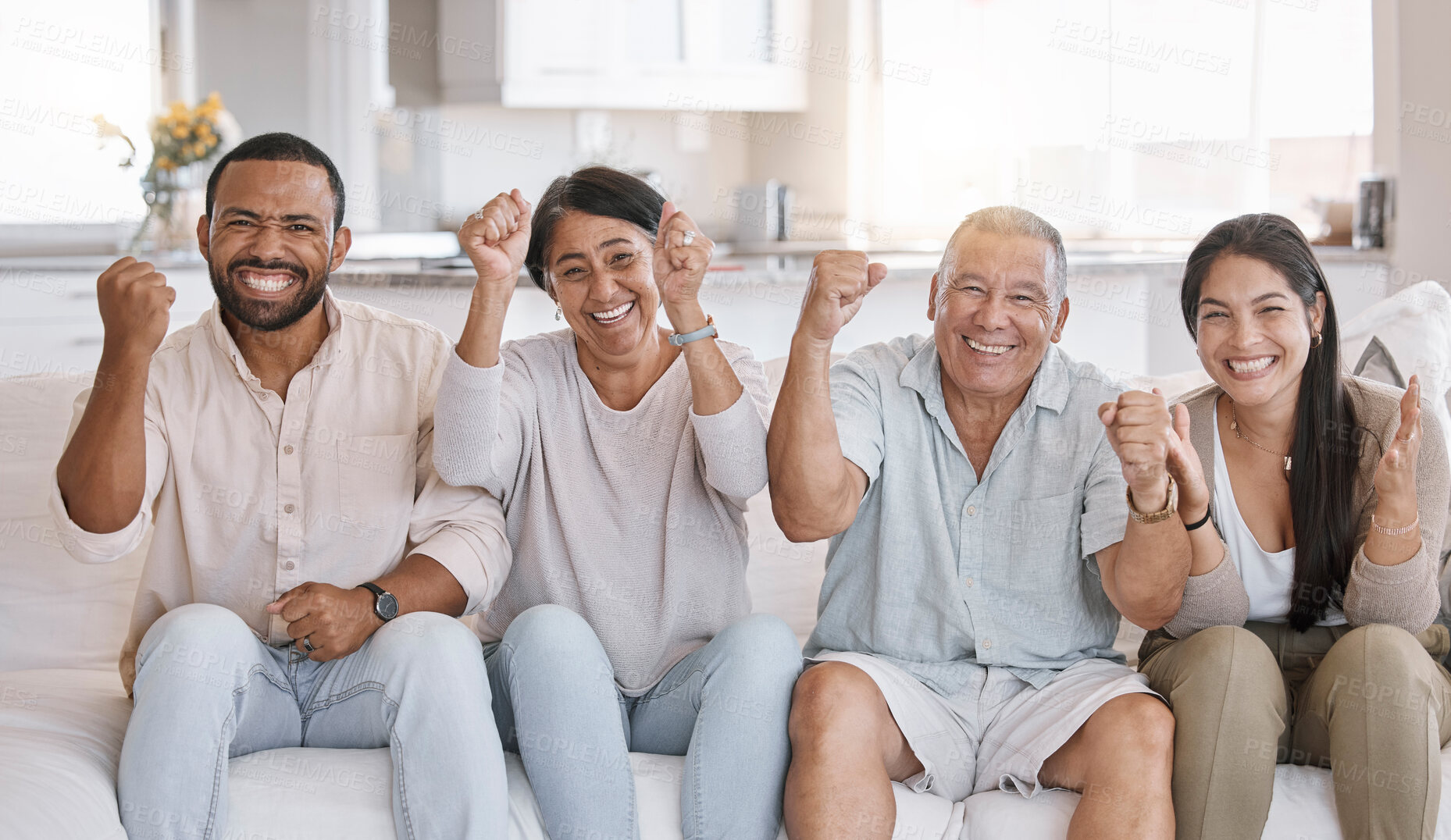 Buy stock photo Fist pump, portrait and smile with family on sofa in living room of home together for celebration. Cheering, happy or relax with senior parents, man and woman sports fans watching tv in apartment