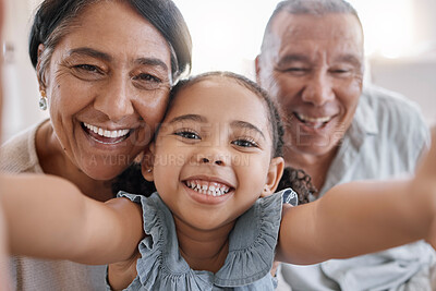 Buy stock photo Selfie, happy and portrait of child with grandparents in home for memory, bonding or family time. Smile, love and face of girl kid with grandmother and grandfather for photography picture in house.