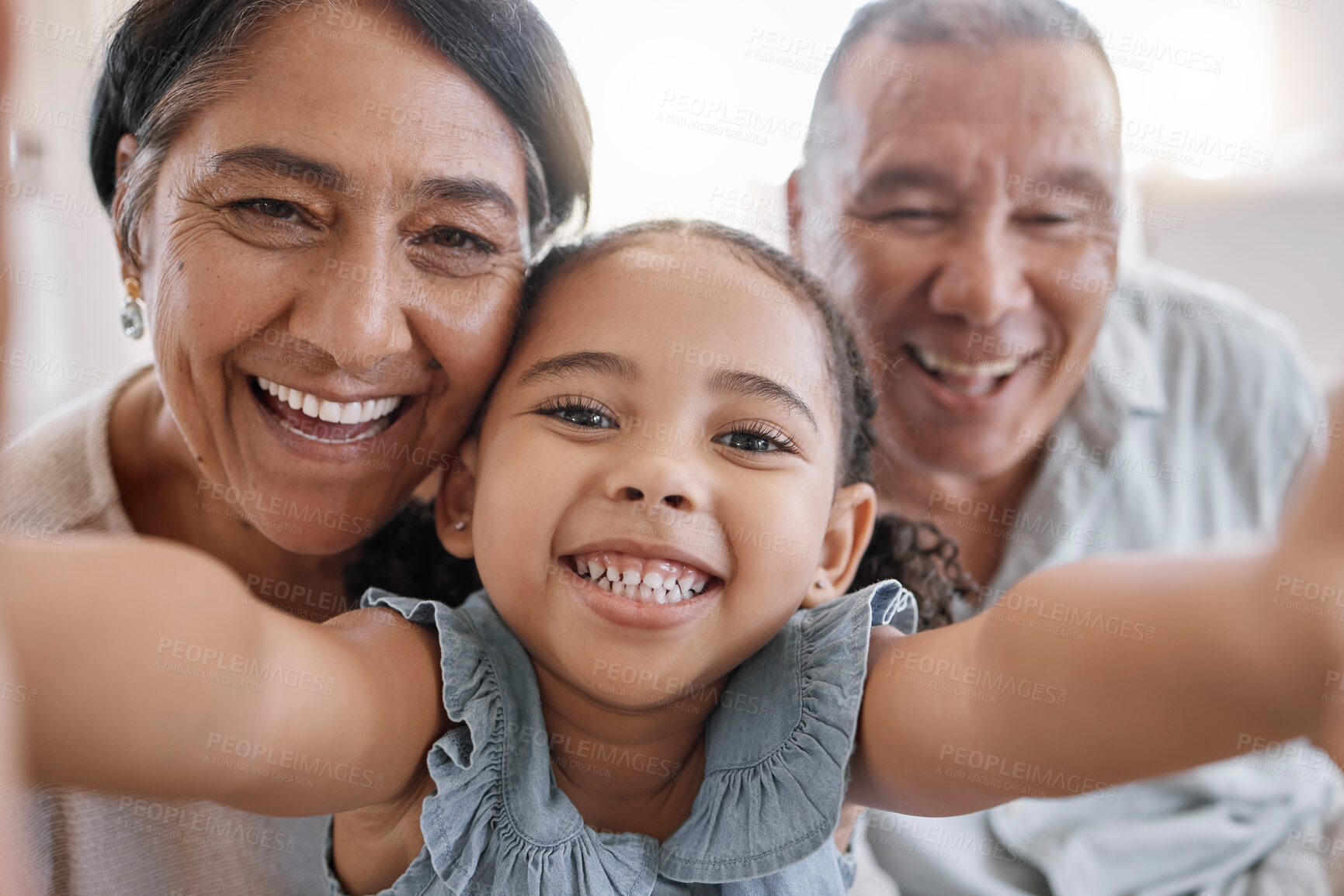 Buy stock photo Selfie, happy and portrait of child with grandparents in home for memory, bonding or family time. Smile, love and face of girl kid with grandmother and grandfather for photography picture in house.