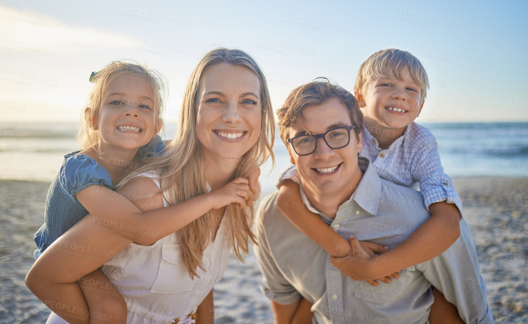 Buy stock photo Parents, kids and happy at beach with piggyback on portrait for bonding, care and love in Mauritius. Family, people and smile with support at seaside on holiday, journey and travel for memories