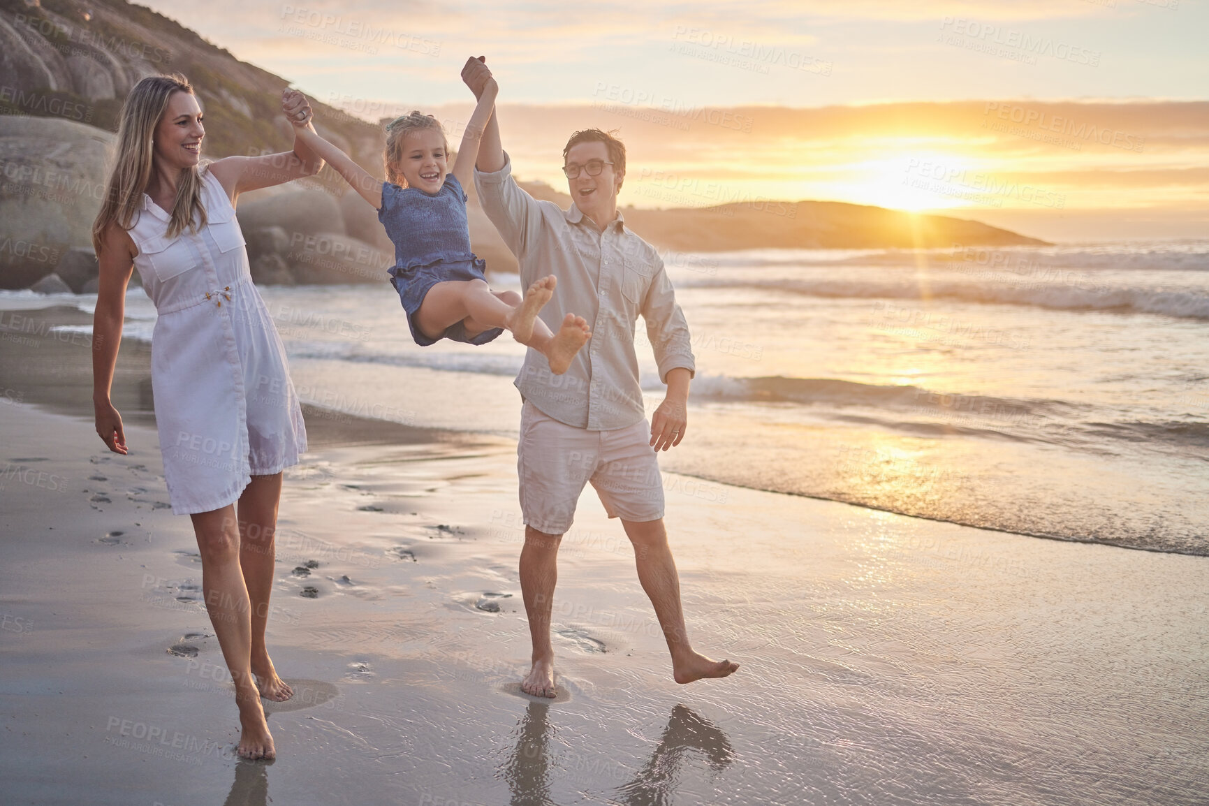 Buy stock photo Beach, father and mother with child for swinging, playful and bonding together on vacation in Miami. Sunset, dad and mom with girl for walking, game and connection with happy daughter on adventure