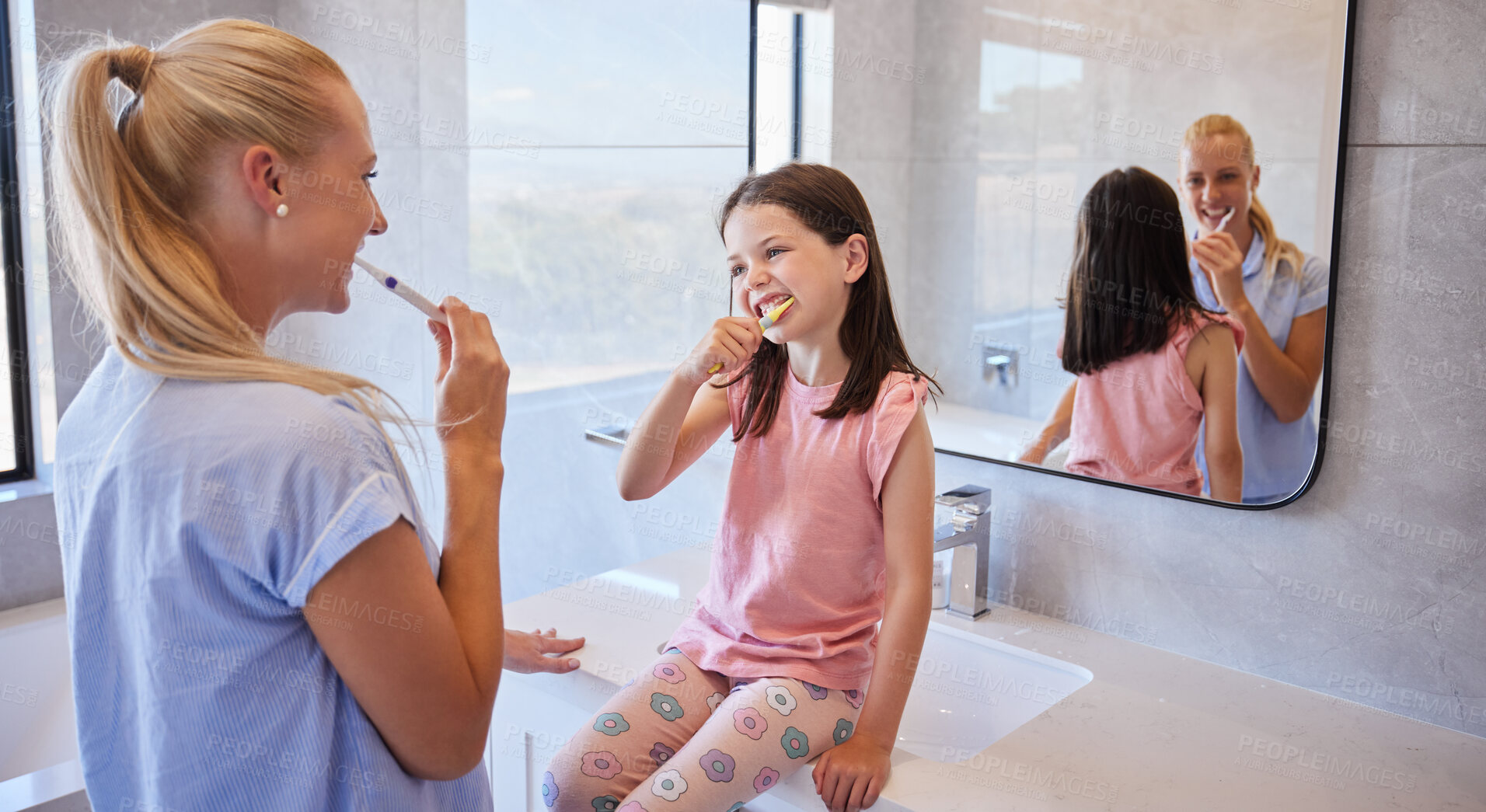 Buy stock photo Mother, girl and brushing teeth in bathroom for dental, teaching and personal hygiene in morning. Woman, family and cleaning mouth in house for learning, oral and breath with toothbrush and support