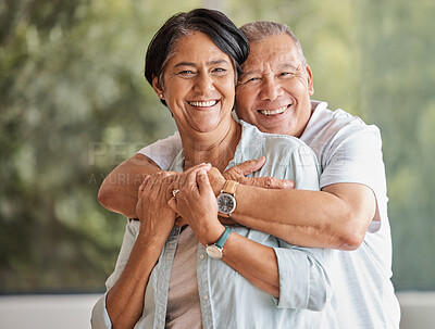 Buy stock photo Hug, portrait and smile with senior couple in sunroom of home together for bonding or romance. Love, security or support with happy elderly man and woman in apartment for retirement or wellness