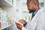 Pharmacy, medicine and black man with tablet to check inventory, stock and medication for online prescription. Healthcare, medical worker and pharmacist with pills, health products and checklist