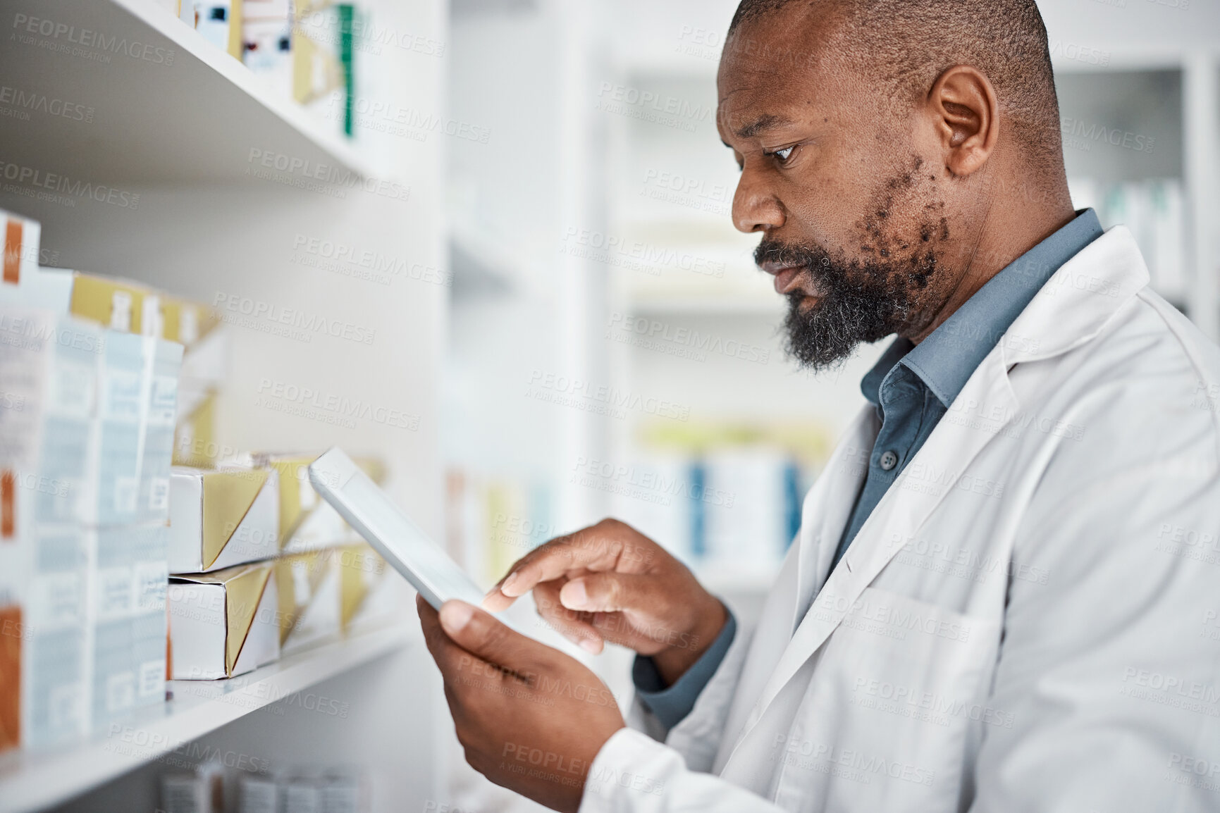 Buy stock photo Pharmacy, medicine and black man with tablet to check inventory, stock and medication for online prescription. Healthcare, medical worker and pharmacist with pills, health products and checklist