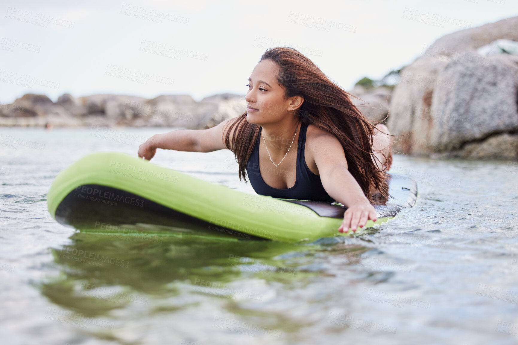 Buy stock photo Fitness, surfer woman surfing in ocean with surfboard, swimwear and peace with sport outdoor and nature. Beach, exercise and young female, surf on waves with adventure and extreme sports on holiday