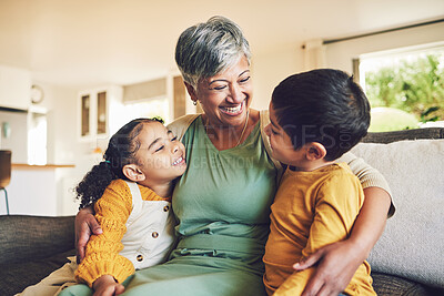 Buy stock photo Hug, grandmother or happy kids on a sofa with love enjoying quality bonding time together in family home. Smile, affection or funny senior grandparent with children siblings on house couch laughing 