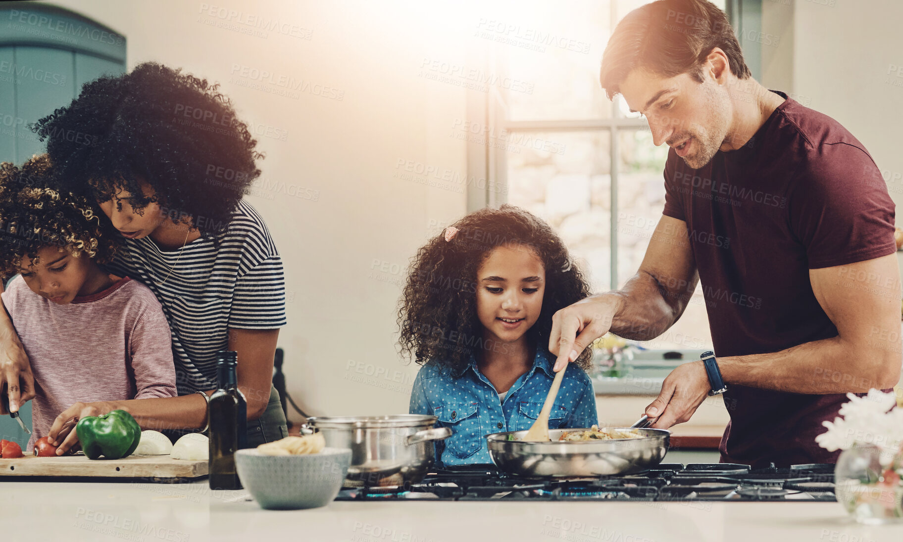 Buy stock photo Family, helping and meal prep for cooking in kitchen with vegetables, teaching and nutrition salad of lunch food. Love, interracial parents and kids for learning vegan diet, healthy dinner and house