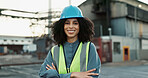 Industrial, portrait and woman with arms crossed at construction site for maintenance, building repairs or project development. Engineer, safety and employee for confidence, infrastructure or labour