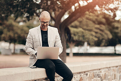 Buy stock photo Business, man and laptop outdoor in city for communication, typing report and reading email feedback. Mature, male person and software research, information and  website design for creativity growth