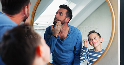 Buy stock photo Morning, bathroom and father with son or reflection, happy and playful for growth or development in house. Dad, boy and mirror in home for learning facial care, grooming and bonding with love.