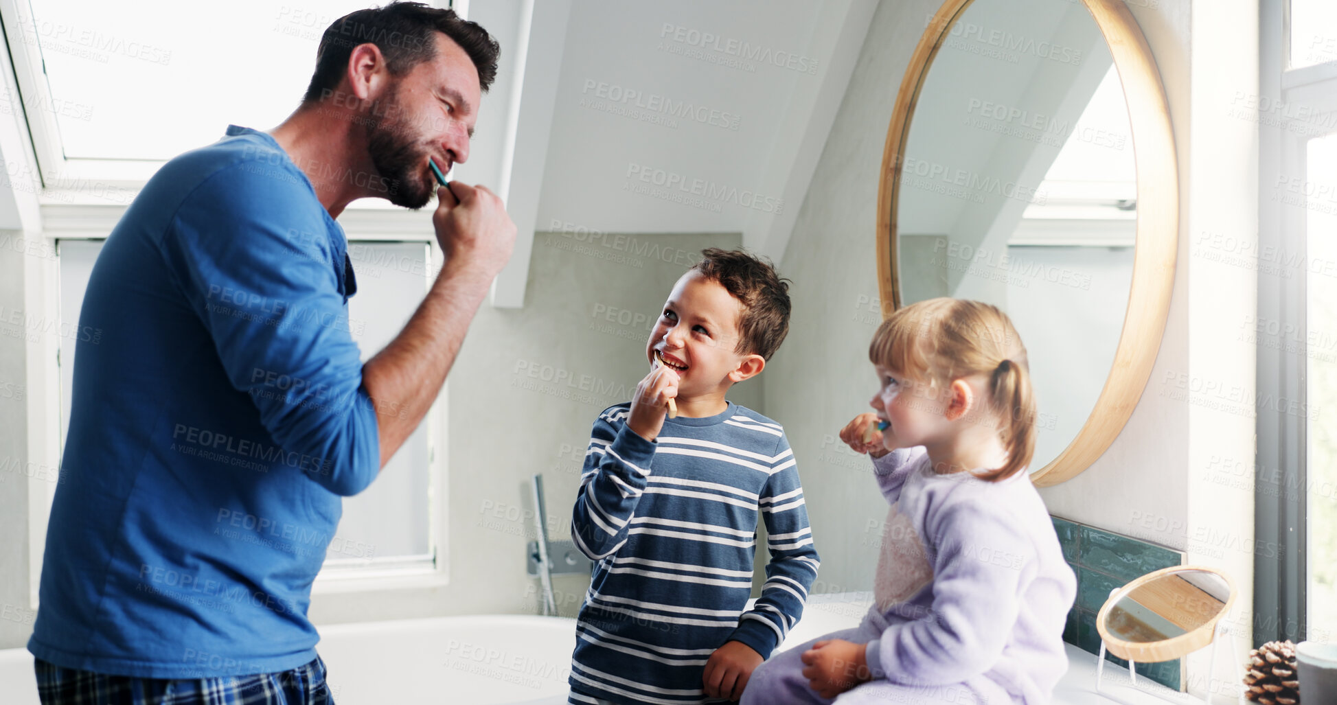 Buy stock photo Father, bathroom and brushing teeth with children in home for morning routine, dental hygiene and oral health. Dad, siblings and teaching with toothbrush for cleaning mouth, bonding and wellness.