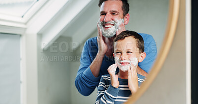 Buy stock photo Shaving cream, reflection and dad with son in bathroom, happy and playful practice for growth or development. Father, boy and mirror in home for learning facial care, grooming and bonding with love.