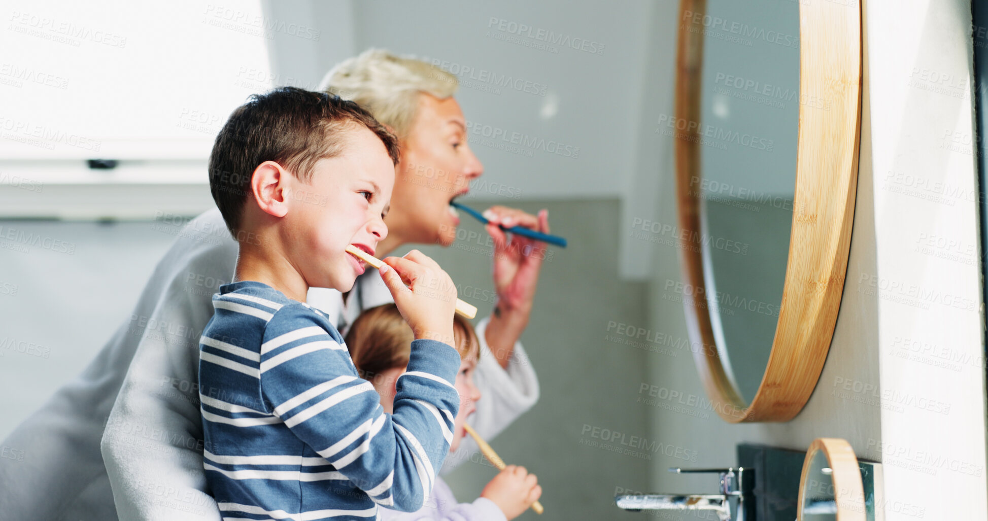 Buy stock photo Oral hygiene, mother and children with brushing teeth in bathroom for dental care education, learning or health. Family, parent or kids in home with cleaning mouth for morning routine or fresh breath