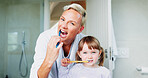 Oral hygiene portrait, mother or child with brushing teeth in bathroom for dental care education, learning or gum health. Family, parent or kid in home with cleaning mouth for routine or fresh breath