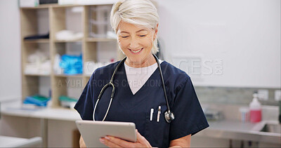 Buy stock photo Happy, mature and woman with tablet in vet for veterinary research, treatment plans and pet medication. Female veterinarian, online and schedule appointment, digital prescription and animal records.