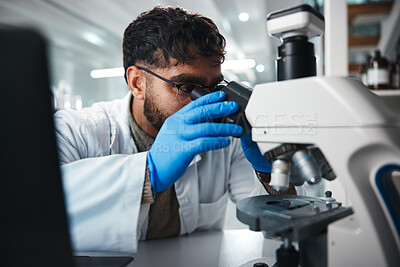 Buy stock photo Man, scientist and microscope for healthcare in lab of experiment research, medical data and studying bacteria. Person, researcher and biotechnology for pharmaceutical development of vaccine solution