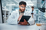 Report, science and tablet with man in laboratory for development, innovation or research. Pharmaceuticals, study and technology with serious scientist at work on medical breakthrough or discovery