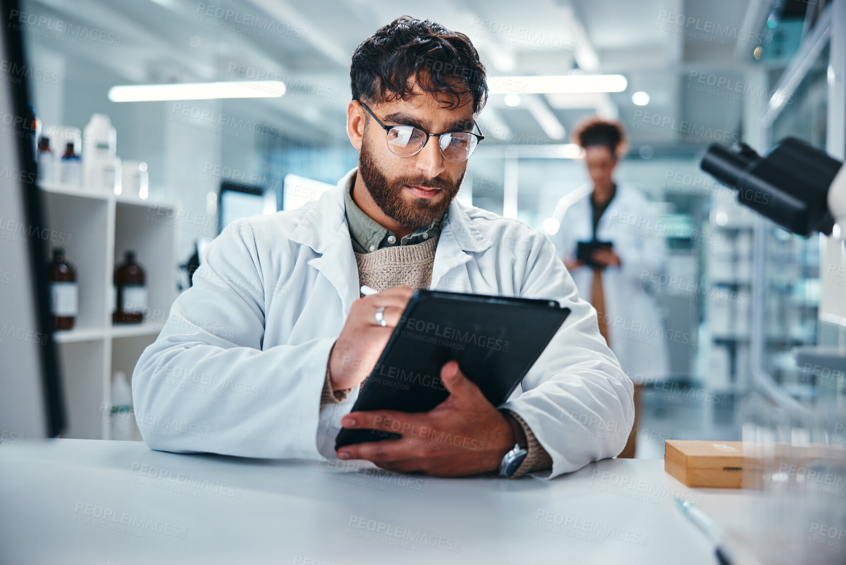 Buy stock photo Report, science and tablet with man in laboratory for development, innovation or research. Pharmaceuticals, study and technology with serious scientist at work on medical breakthrough or discovery