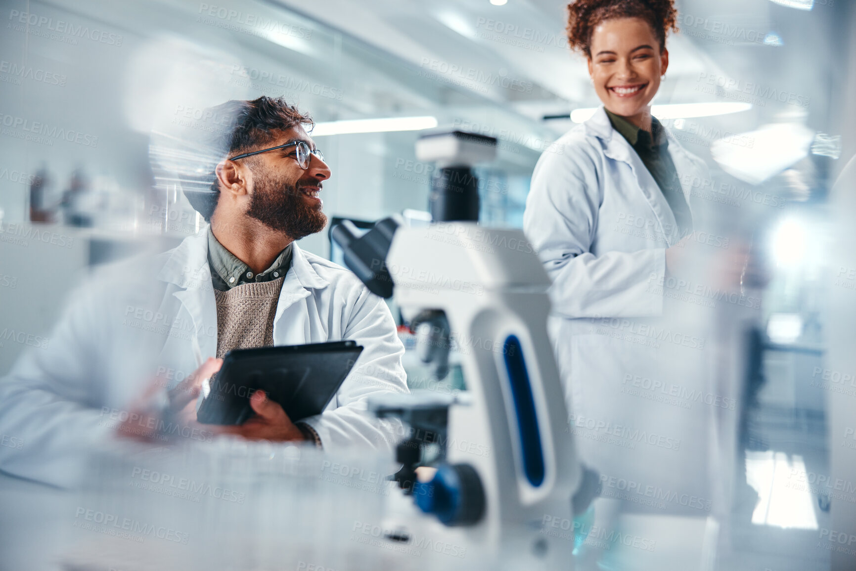 Buy stock photo Tablet, scientist and team with smile, medical research and man for results of test and talking. Lab, online and conversation for medicine of healthcare, pharmaceutical and collaboration for science