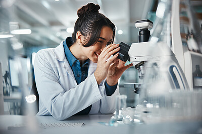 Buy stock photo Woman, healthcare and scientist with microscope in lab of experiment research, medical data or study bacteria. Smile, researcher and biotechnology for pharmaceutical development of vaccine production