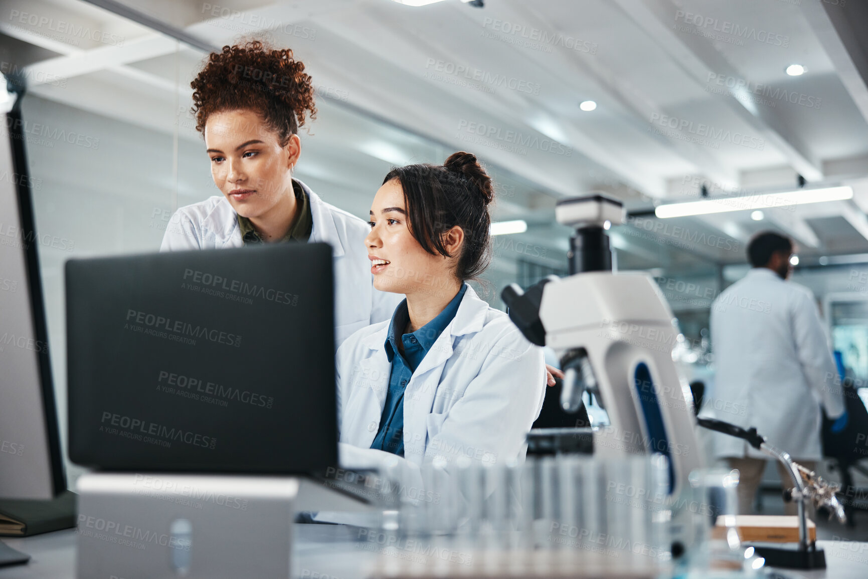 Buy stock photo Laptop, science and smile with women in laboratory for development, innovation or research. Computer, pharmaceuticals and study with scientist team at work on medical breakthrough or discovery