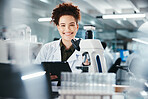 Woman, portrait and scientist with tablet or microscope in lab, experiment research and medical data for science. Smile, researcher and digital for biotechnology study, feedback and vaccine medicine