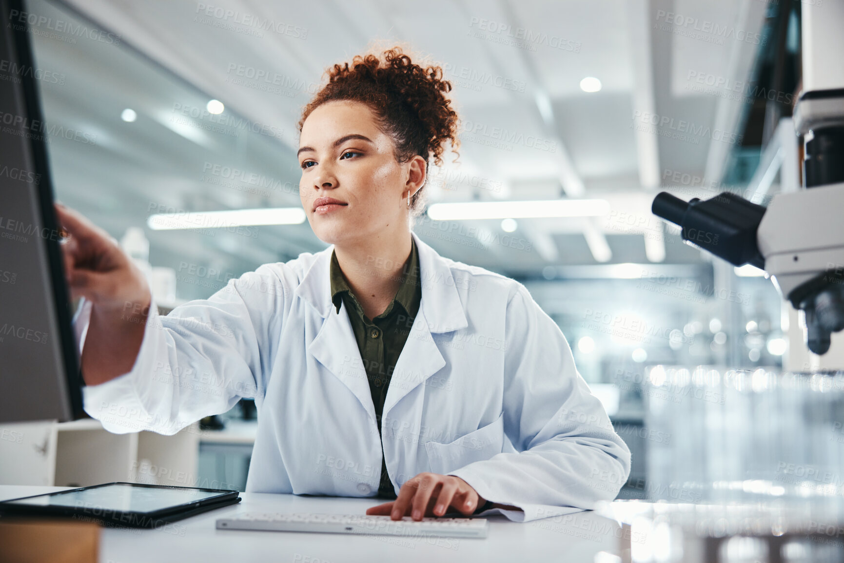 Buy stock photo Computer, pointing and science with woman in laboratory for development, innovation or research. Pharmaceuticals, report or review and scientist at work on medical breakthrough, discovery or feedback