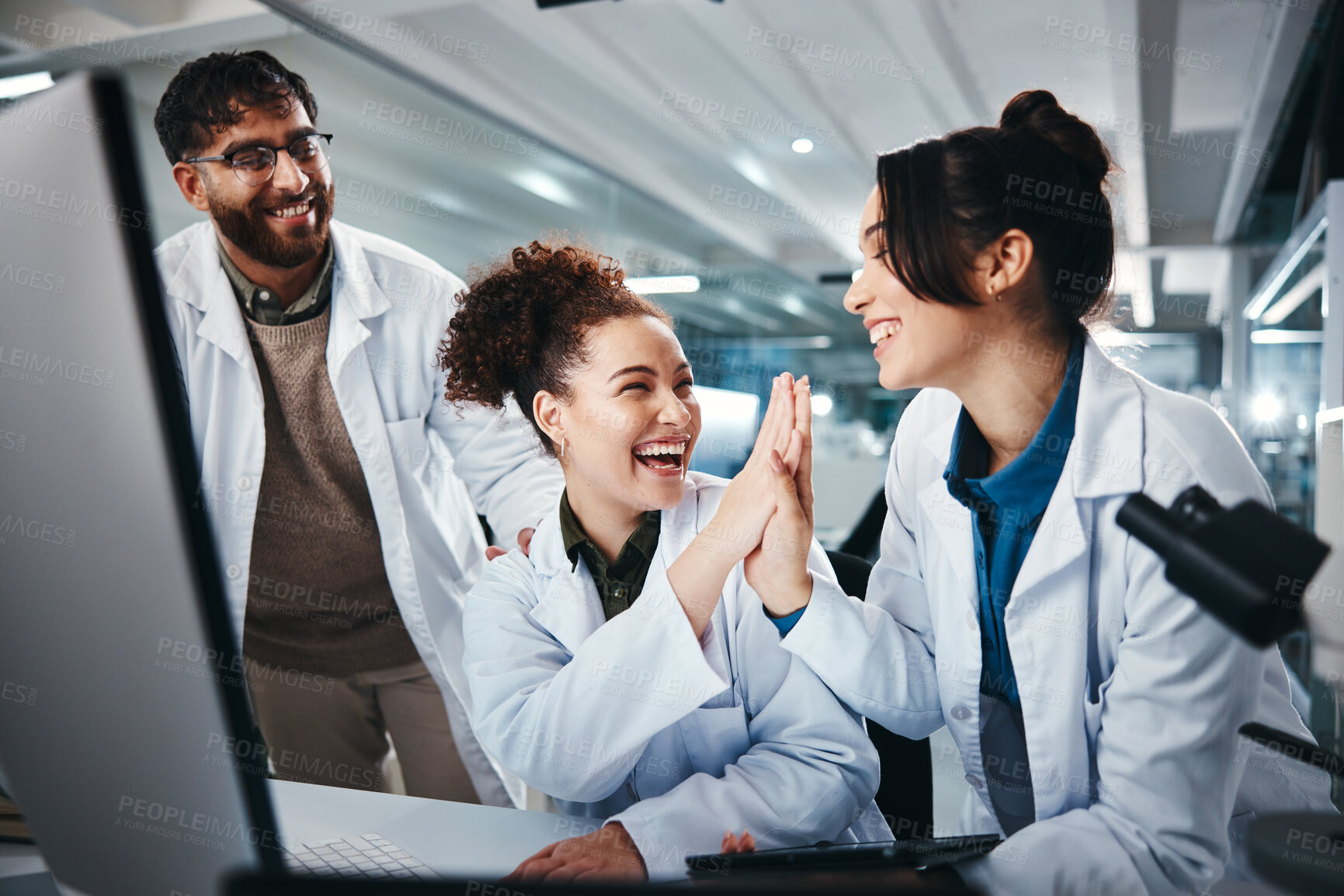 Buy stock photo Computer, scientist and women with success, medical research and celebration for results of test and man. Lab, online and conversation for medicine of healthcare, pharmaceutical and high five