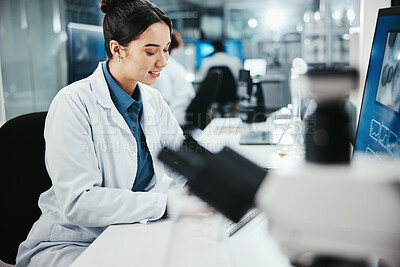 Buy stock photo Biotechnology, woman and medical scientist in laboratory with online research for cancer clinical trial. Science, computer and female biologist with pharmaceutical discovery for healthcare innovation