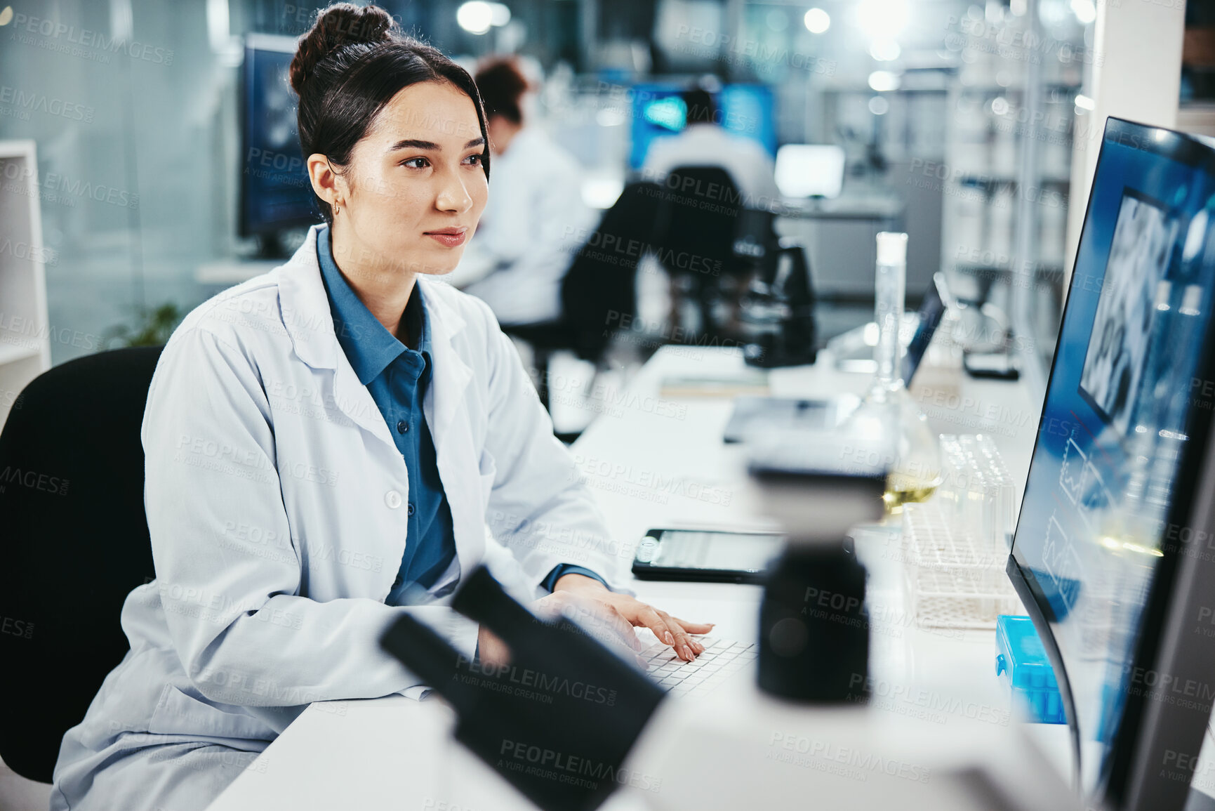 Buy stock photo Computer, woman and medical scientist in laboratory with online research for cancer clinical trial. Science, biotechnology and female biologist with pharmaceutical discovery for healthcare innovation