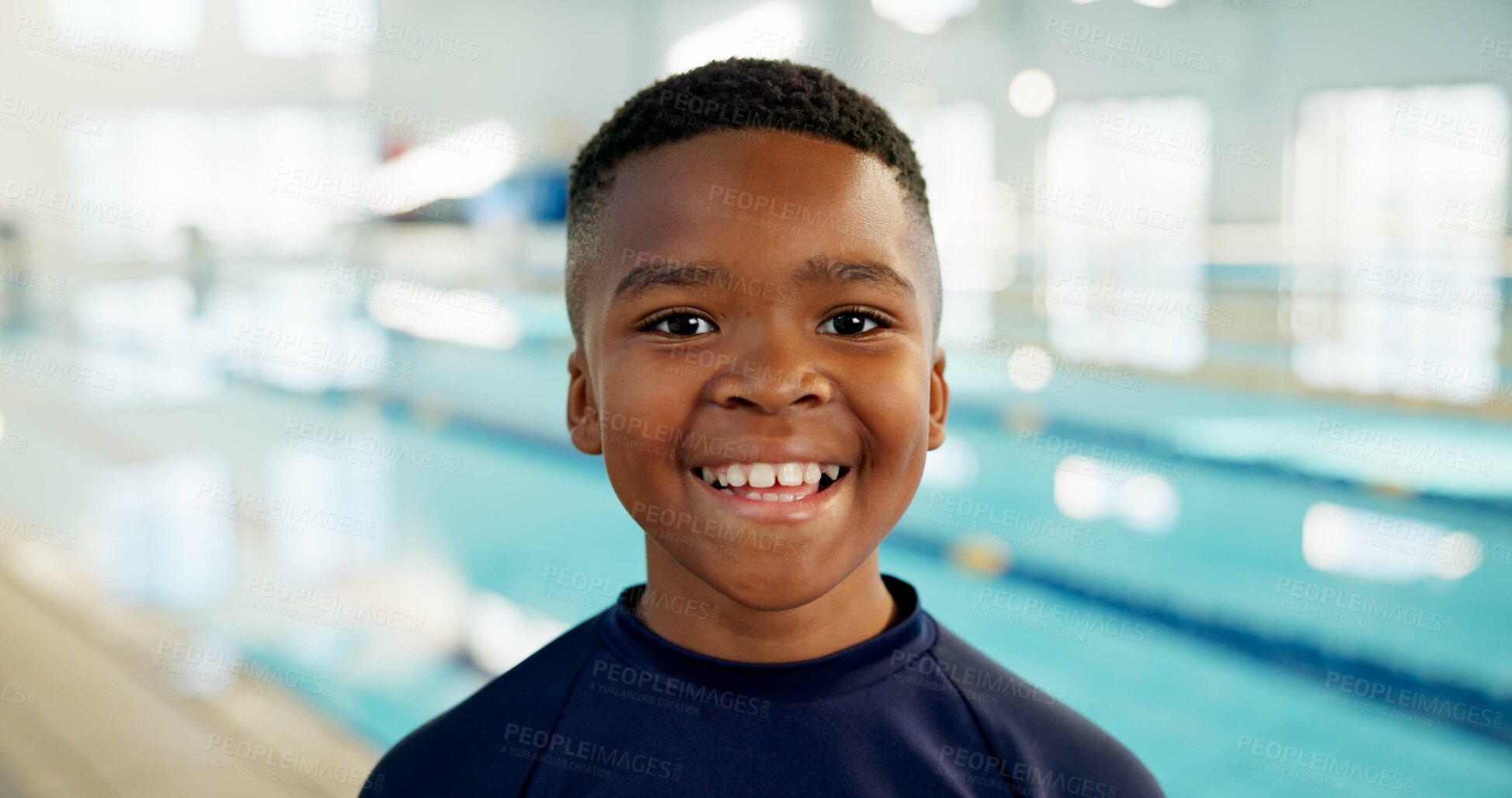 Buy stock photo Boy, black child and happy with portrait by pool for indoor swimming lessons, skill development and muscle growth. Male kid, water sports and student for learning, progress and improvement by school.