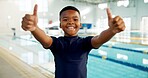 Portrait, black boy and happy with thumbs up at swimming center for training, workout and practice for child development. Kid, agree and smile or confident for sports challenge and tournament