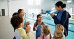 Swimming, lesson and teacher with kids with applause for learning, practice and training success. Teamwork, celebrate and swimmer instructor with children for exercise, fitness and water sports class