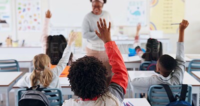 Buy stock photo Children, back and hands raised at school for question, answer and learning at youth academy. Kids, education and teacher for development with sign for talking, quiz and scholarship in classroom