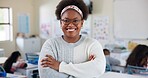 Crossed arms, teacher and portrait of black woman in classroom with confidence in education career. Smile, pride and African female tutor with job in childhood development at school academy.