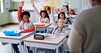 Children, classroom and hands raised at school for questions, answer and learning at youth academy. Kids, education and teacher for development with sign for talking, quiz and scholarship for future