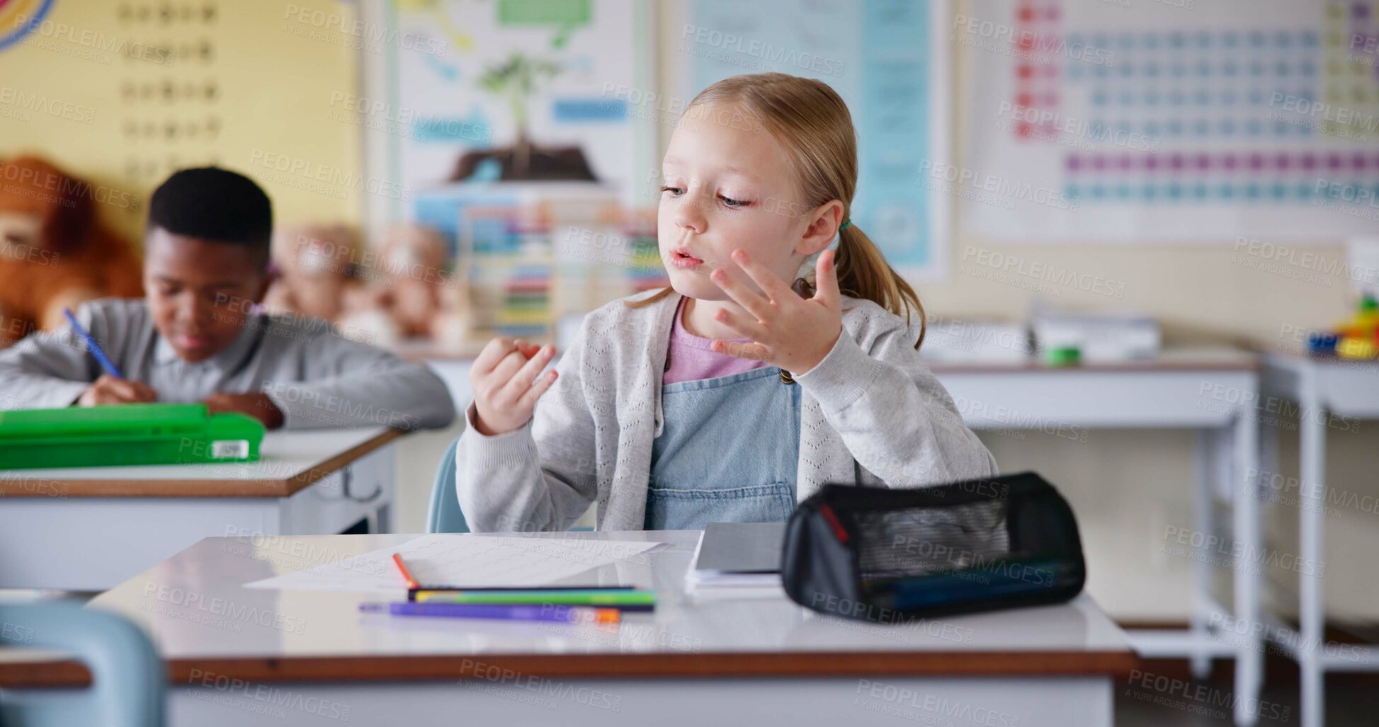 Buy stock photo Girl, counting and fingers in classroom for math test, solution or assessment for development at academy. Child, learning and quiz for education, thinking or problem solving for scholarship at school