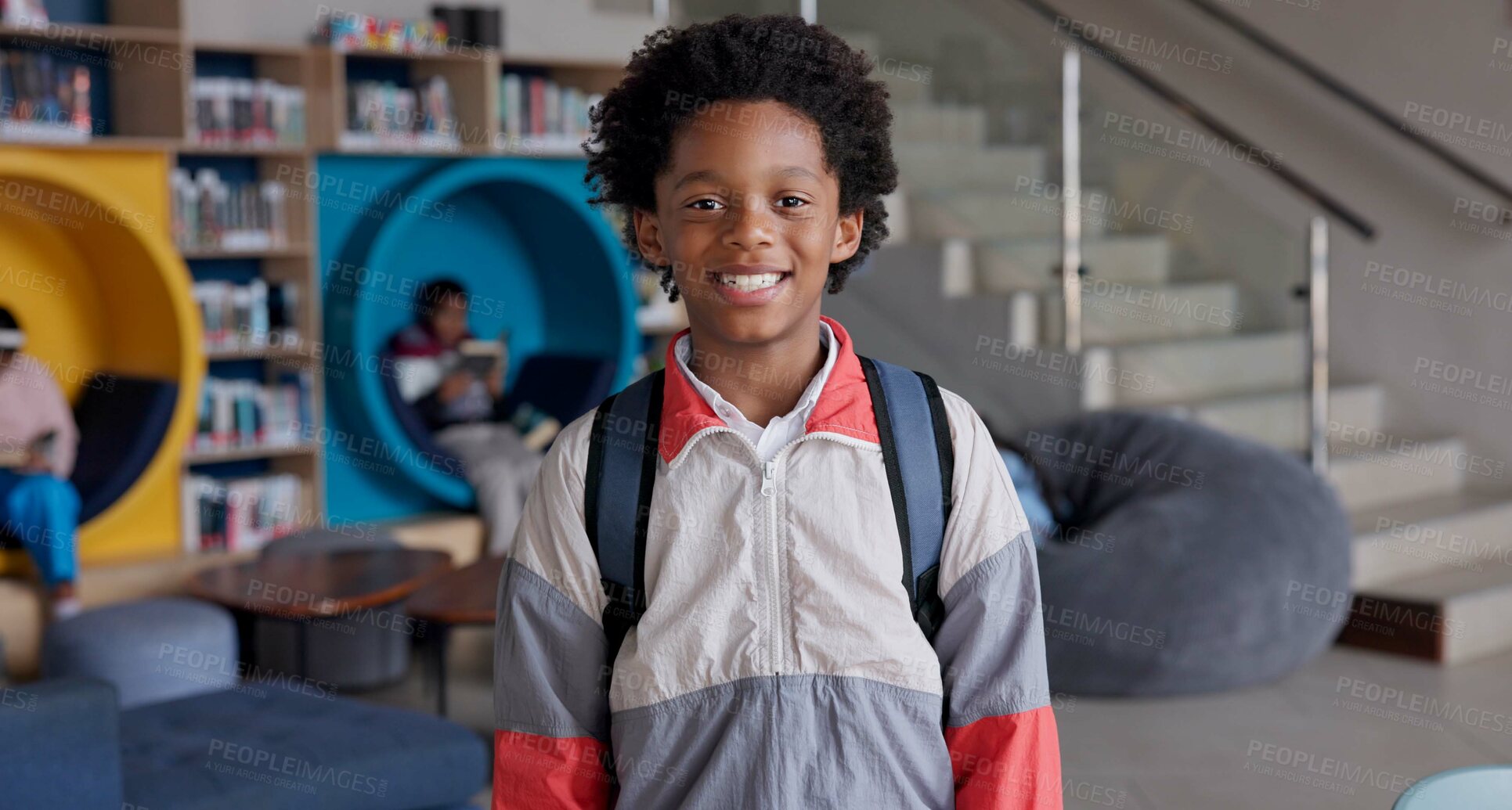 Buy stock photo Portrait, boy and smile with backpack, library and happy for education in academy and joy for learning. Scholarship, proud and student studying in USA, confident and back to school, youth and bag