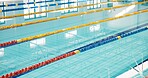 Swimming pool, empty and lines with game, fitness and water for sports, cardio workout and lanes. Competition, blue and swim training arena ready for race performance, dividers and exercise challenge