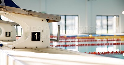 Buy stock photo Swimming pool, sports and podium with number in gym for practice, training and exercise for event. Water, aquatic center and diving board for international race, challenge and competition for fitness