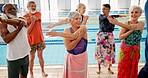 Swimming pool, senior people and warm up for learning, exercise and training together indoors. Water sports, hydro and physiotherapy for group aqua rehabilitation, health and wellness with coach