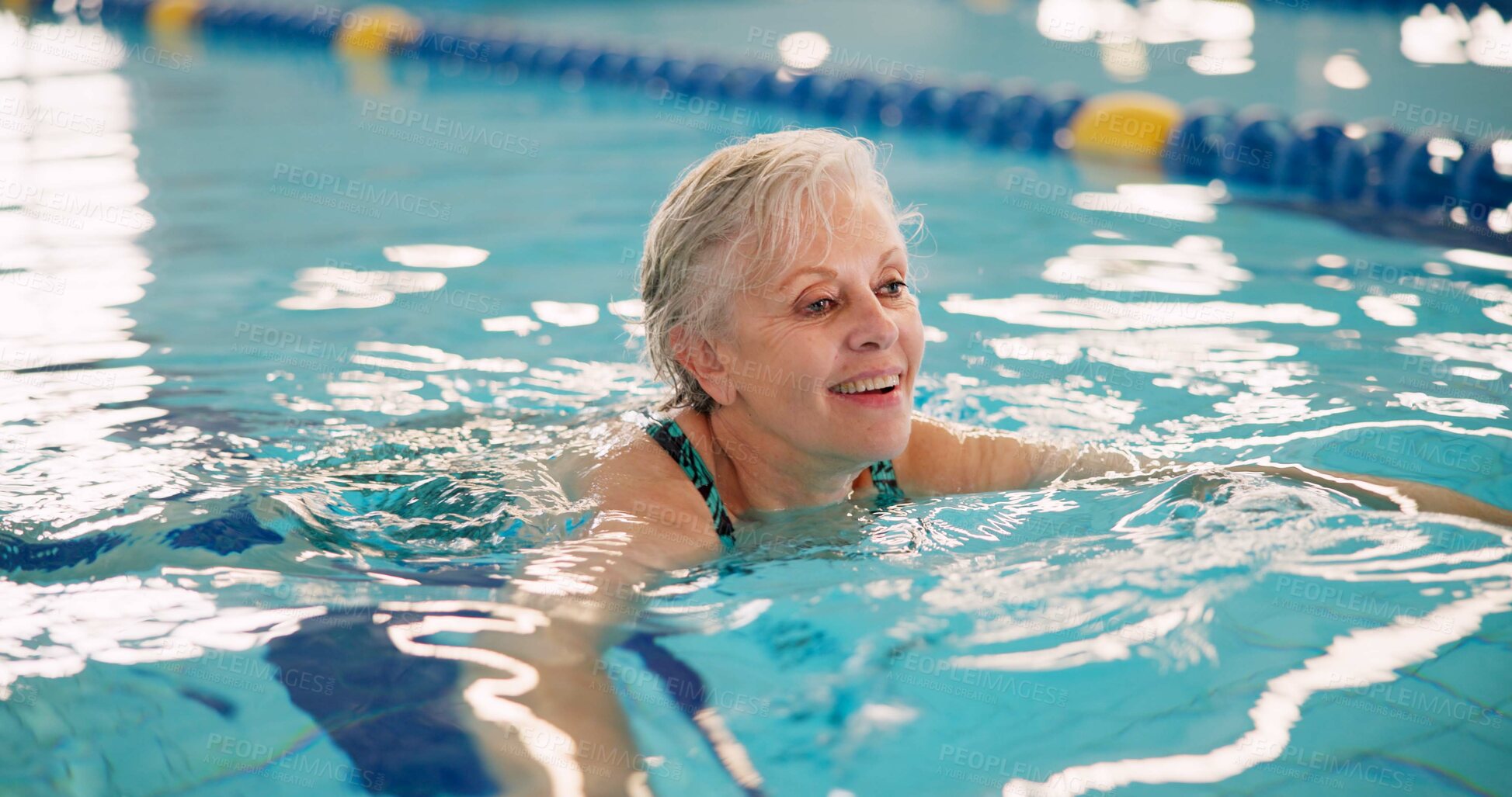 Buy stock photo Swimming pool, senior woman and fitness with smile, exercise and recreation with wellness. Mature person, playful and lady with water aerobics, healthy and cardio workout with physical therapy or joy