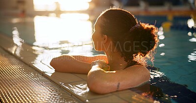 Buy stock photo Swimming pool, sport and woman relax at edge after practice for body health, fitness or thinking of wellness. Swimmer, recovery or athlete rest in water at gym on break after exercise or hydrotherapy