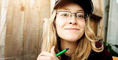 Buy stock photo A cute young student looking natural while waiting for an idea to inspire her